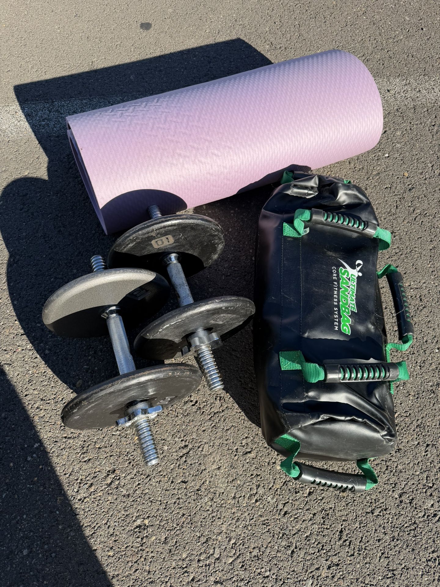 Dumbbells And Sandbag