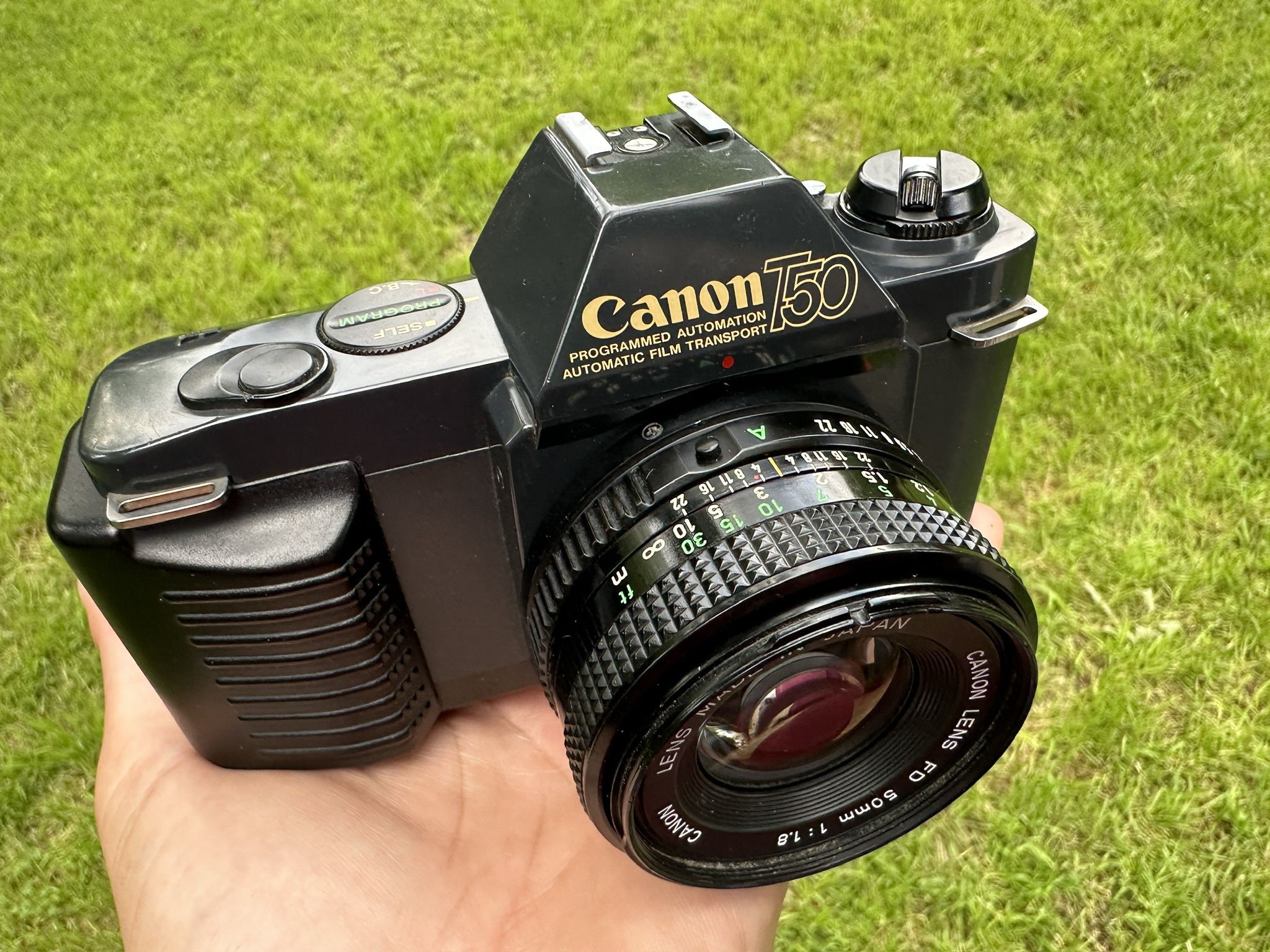 Canon T50 + 50mm 1.8  35mm film slr camera