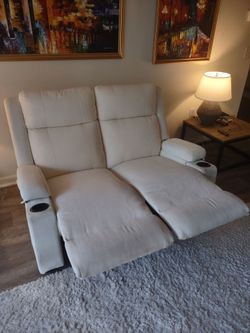 Two seater recliner with cupholders
