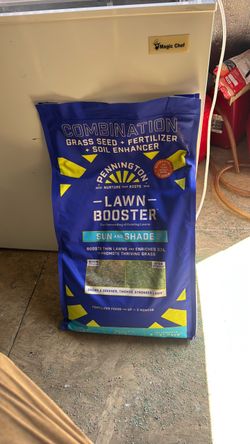 Grass seed with fertilizer and soil enhancements