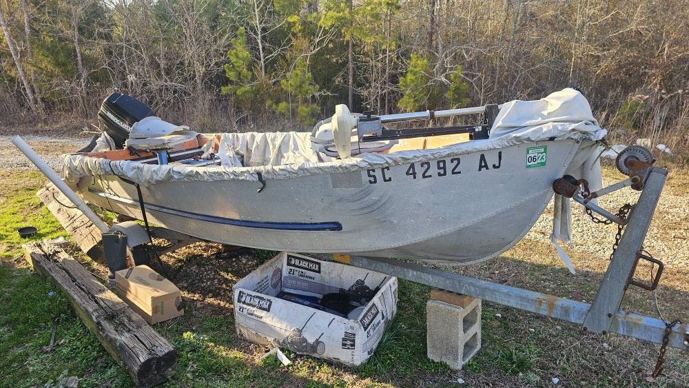 Fishing Bout With Shorelanr trailer. 25 Horse Power Mercury