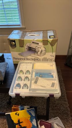 Cricut Electronic Cutter with cartridges