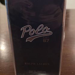 Pola

67

RALPH LAUREN

EAU DE PARFUM

SPRAY/VARORIBAT

4.2 FL. OZ.  NEW STILL SEALED AND WRAPPED