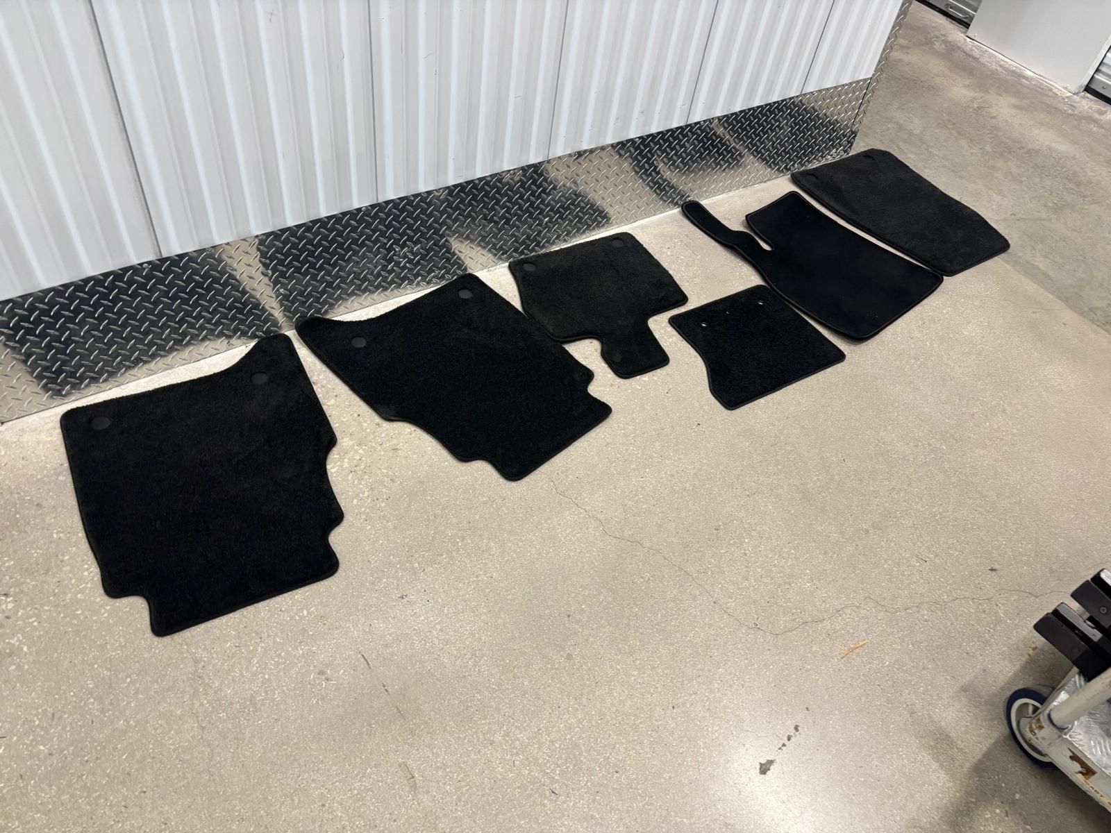 Six Land Rover floor mats $40