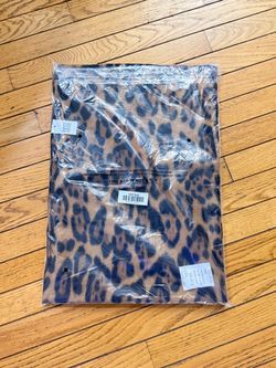 Leopard print fringe scarf