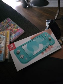 Nintendo Switch w/ SD card and 4 Games