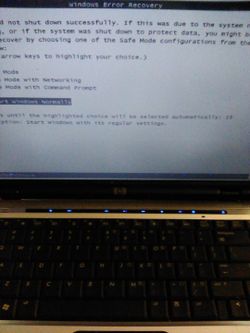 HP Pavilion DV2000 Entertainment Laptop with Windows Vista. Screen has contrast issues otherwise works good