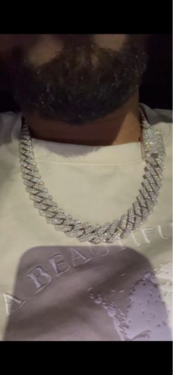 304 gram white gold Cuban link chain bust down