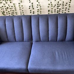 Blue Sofa Bed with Pillows
