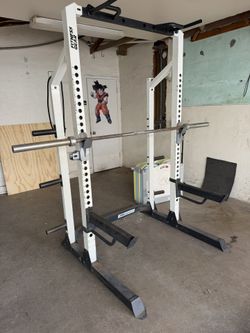 Squat Rack With Olympic Barbell