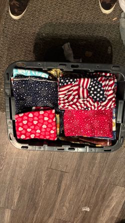 Box of fabric all different patterns and sizes