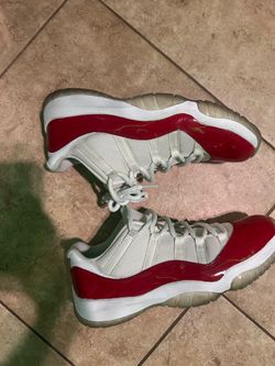 jordan 11 lows red