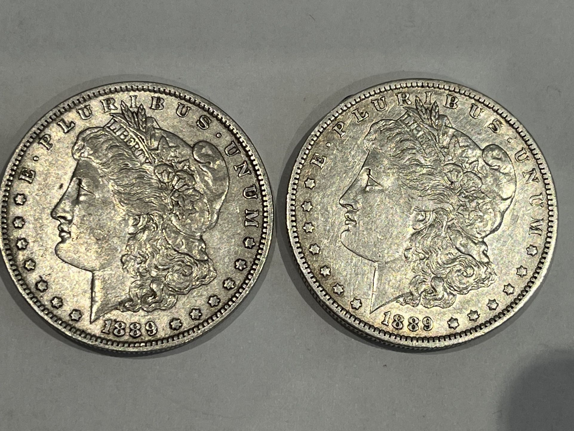 Two 1889-O Morgan 90% Silver Dollars 