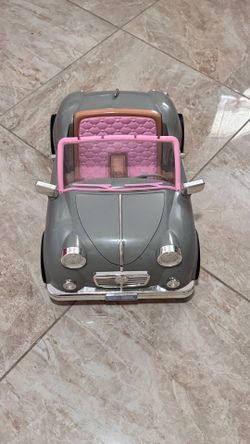 Our Generation retro convertible car fits 18-inch dolls