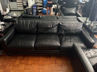Black Leather Sectional Sofa with Nailhead Trim