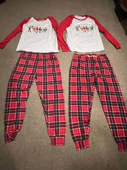Christmas. semi-new pajamas.  Set. 2.  pieces Men and women. . $10.00 each.   check my other offers 