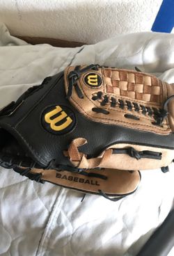 4 baseball gloves, balls, and a Nike BASEBALL bag. $20