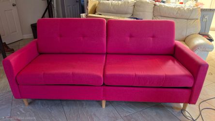 Pink couch with storage