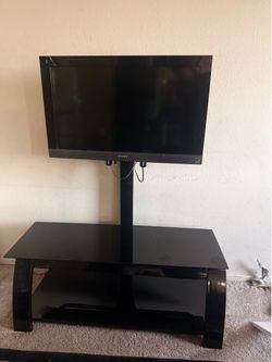 Tv stand and TV included !!!