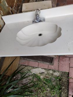 Beige Bathroom Vanity With Faucet