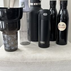 Six black water bottles. Includes a 16oz Thermos Funtainer With Locking Lid 
