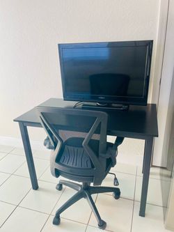 Black desk and Office chair