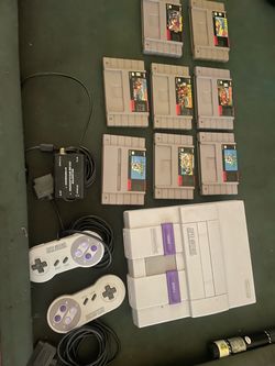 Super Nintendo (SNES) with games