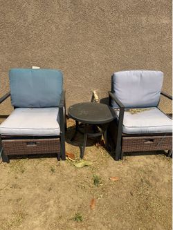 2 chairs and table.