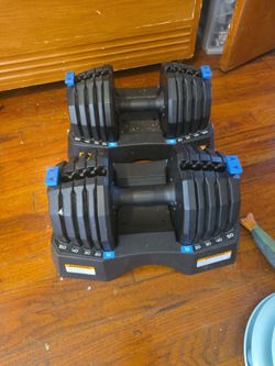 Adjustable dumbells