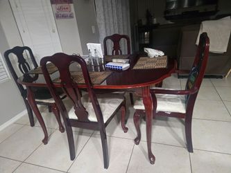 Dinning room with a leaf to sit 8 people, 7 chairs available