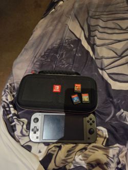 Nintendo Switch Lite Limited Edition Dialga & Palkia Holiday Bundle with 3 games