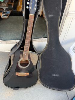 Acoustic guitar with case
