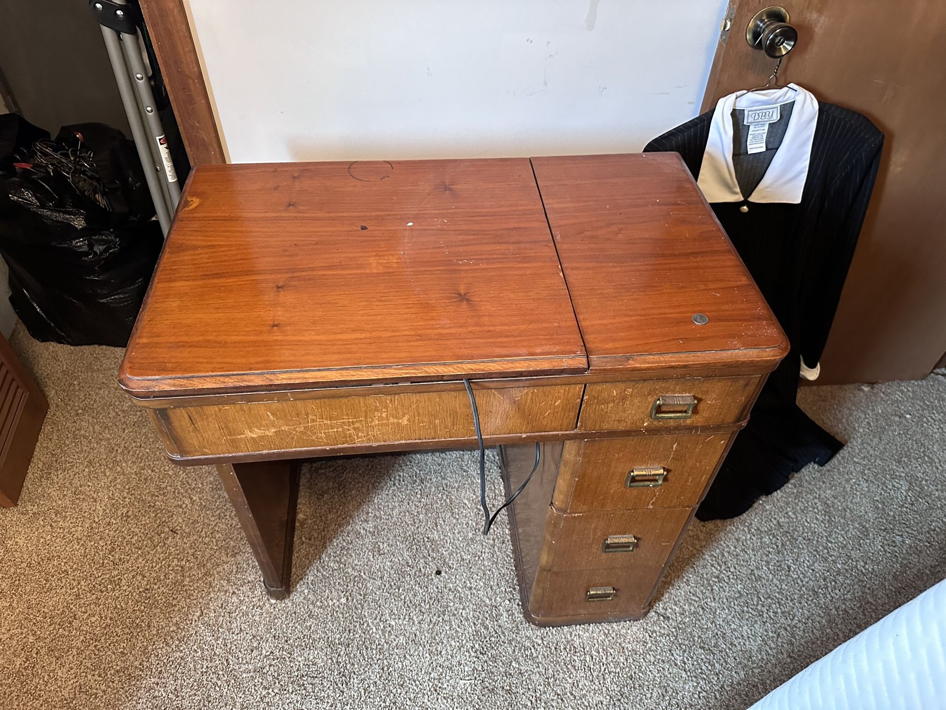 Vintage Sewing Machine And Cabinet