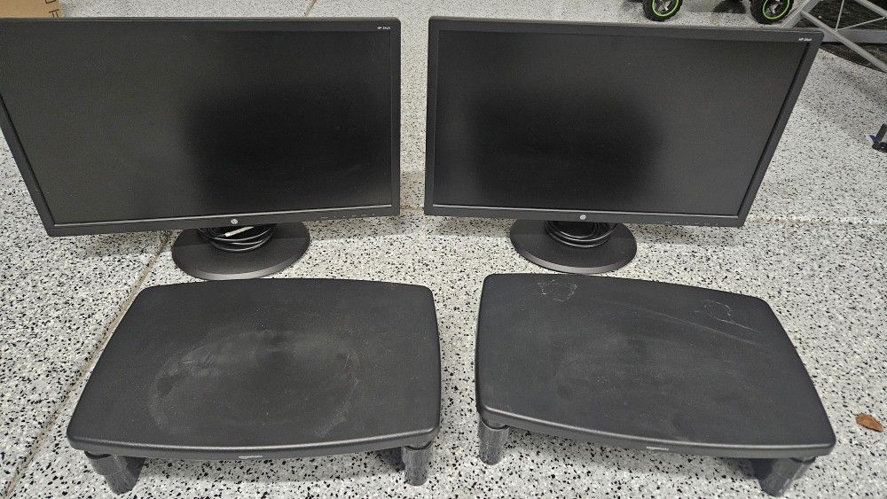 (2) HP  Monitors with HDMI cables and stands