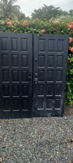Exterior solid wood black double doors approximate 32x32x79
