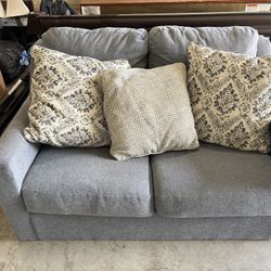 Blue Loveseat with Round Coffee Table