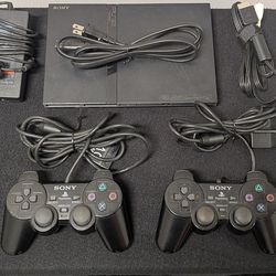 PlayStation 2 + Two Controllers