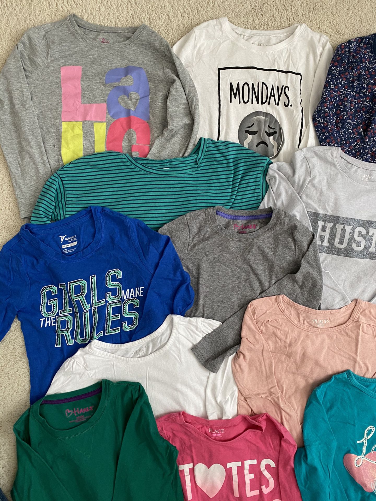Girls long sleeve shirts, sizes 7-8, $1 each