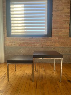 Nesting tables: dark wood tops and metal legs
