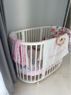 Baby crib bed oval with mattress