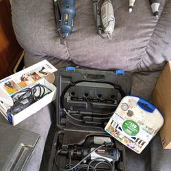 Assorted Dremel Tools And Attachments