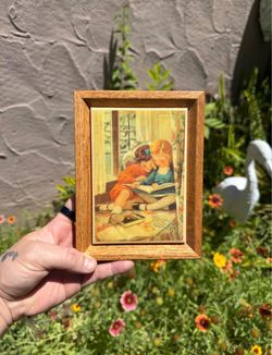 Vintage wooden frame with porcelain picture of boy & girl reading