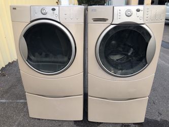 Kenmore beige front load washer dryer set