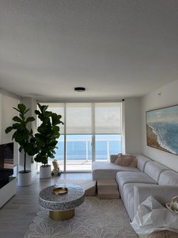 Very comfy light grey sofa