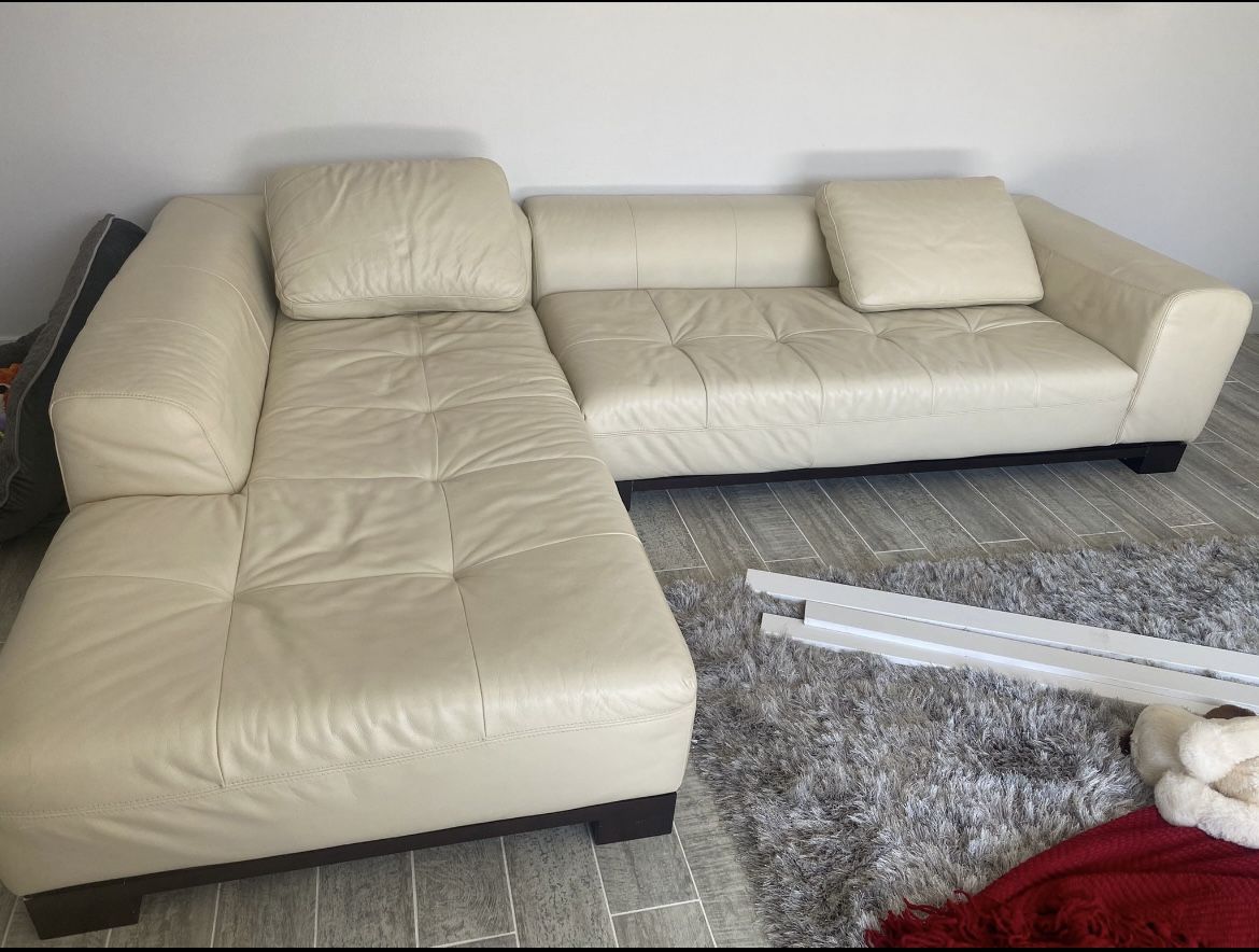 beige Faux leather couch Excellent condition like new no dog no cats no kids