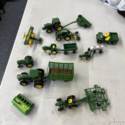 John Deere collectibles some metal some plastic