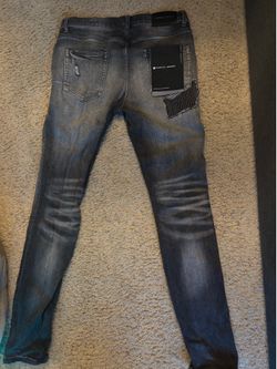 Black tag purple jeans