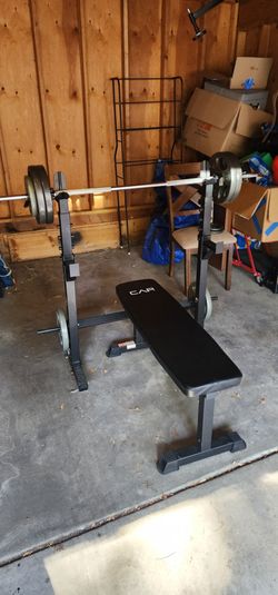 CAP adjustable bench/squat/dip rack with weights, bar, and clips