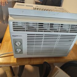 Air Conditioner lightly used with covers for window