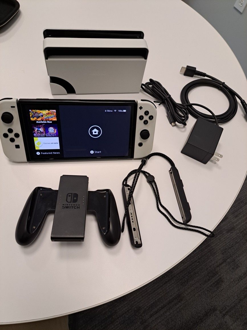 Nintendo Switch OLED Console With 2 Traveling Cases & Two Controllers